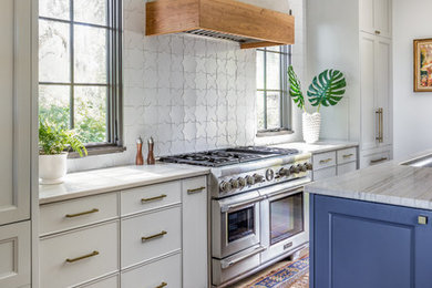 Example of a tuscan kitchen design in Charleston