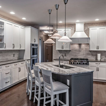 Contrasting White and Dark Gray Cabinets and Countertops in Crownsville, MD
