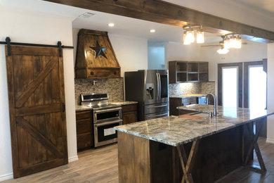 Inspiration for a mid-sized rustic u-shaped dark wood floor and brown floor eat-in kitchen remodel in Houston with a farmhouse sink, raised-panel cabinets, dark wood cabinets, granite countertops, multicolored backsplash, matchstick tile backsplash, stainless steel appliances, an island and multicolored countertops