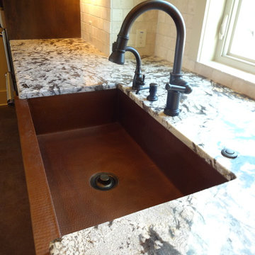 Copper farmhouse sink with Oil-Rubbed fixtures