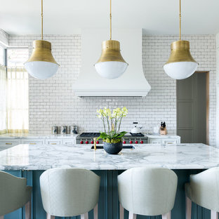 Mid-sized contemporary eat-in kitchen designs - Example of a mid-sized trendy u-shaped medium tone wood floor and brown floor eat-in kitchen design in Dallas with an undermount sink, beaded inset cabinets, white cabinets, marble countertops, white backsplash, subway tile backsplash, paneled appliances and an island