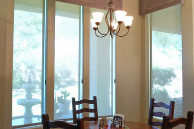 This is an example of a medium sized traditional open plan dining room in Phoenix with porcelain flooring and beige floors.