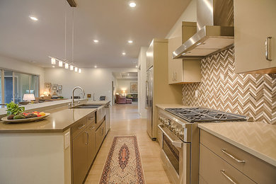 Open concept kitchen - large contemporary light wood floor open concept kitchen idea in Albuquerque with a farmhouse sink, flat-panel cabinets, brown cabinets, quartz countertops, multicolored backsplash, stone tile backsplash, stainless steel appliances and an island