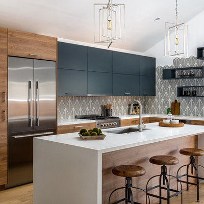 Open concept kitchen - large contemporary l-shaped medium tone wood floor and beige floor open concept kitchen idea in Orange County with an island, an undermount sink, flat-panel cabinets, medium tone wood cabinets, gray backsplash and stainless steel appliances