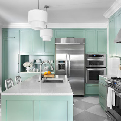 Example of a trendy multicolored floor kitchen design in Atlanta with stainless steel appliances and blue cabinets