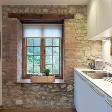 Exposed Stone Wall - Photos & Ideas | Houzz