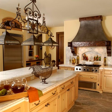 Country French Recessed Panel Knotty Pine Kitchen with Flagstone Flooring