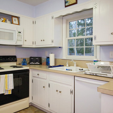 Country Style Kitchen with New Windows with Grilles