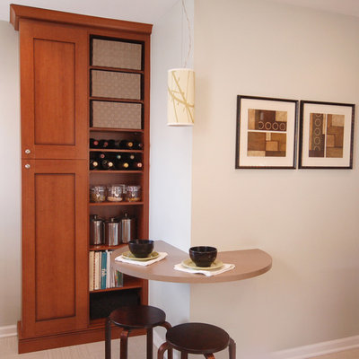 Small trendy l-shaped linoleum floor kitchen photo in Chicago with a drop-in sink, medium tone wood cabinets, white backsplash and stainless steel appliances
