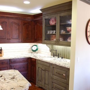 Inspiration for a large transitional u-shaped eat-in kitchen in Orange County with a farmhouse sink, louvered cabinets, green cabinets, granite benchtops, white splashback, subway tile splashback, coloured appliances, medium hardwood floors and with island.
