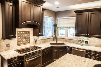 Example of a transitional kitchen design in Wichita