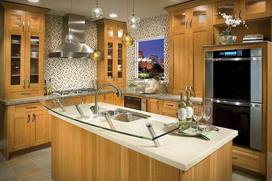 Eat-in kitchen - large craftsman l-shaped eat-in kitchen idea in Seattle with an undermount sink, shaker cabinets, light wood cabinets, quartzite countertops, multicolored backsplash, mosaic tile backsplash, stainless steel appliances and an island