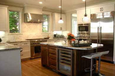 Large transitional u-shaped light wood floor eat-in kitchen photo in San Francisco with a single-bowl sink, shaker cabinets, white cabinets, marble countertops, mosaic tile backsplash, stainless steel appliances and an island