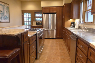 Example of an arts and crafts kitchen design in Austin