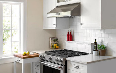 A Pullout Countertop Adds Function to a 90-Square-Foot Kitchen