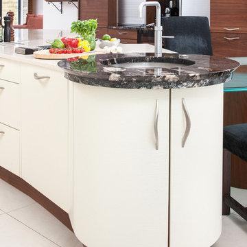 Cream and timber kitchen with curved island