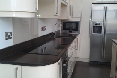 This is an example of a contemporary kitchen in London.