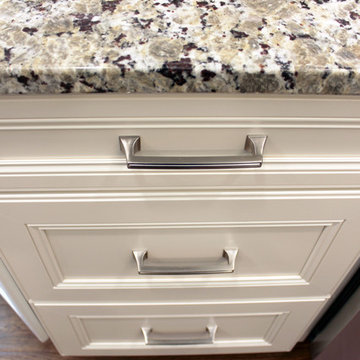 Cream Kitchen with Green Island with Butcher Block Countertop