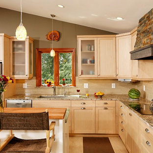 This is an example of a small arts and crafts l-shaped open plan kitchen in DC Metro with an undermount sink, shaker cabinets, light wood cabinets, granite benchtops, beige splashback, glass tile splashback, stainless steel appliances, linoleum floors and with island.