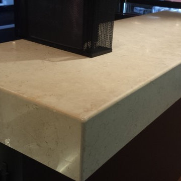 Crema Marfil Marble countertops with a 120mm front fascia