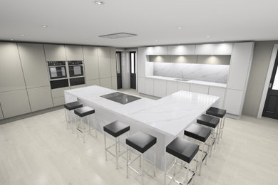 Inspiration for a large modern kitchen/diner in Cardiff with an integrated sink, flat-panel cabinets, white cabinets, engineered stone countertops, black appliances, porcelain flooring, an island, yellow floors and white worktops.