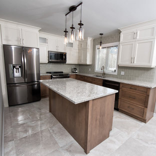 Inspiration for a mid-sized transitional l-shaped eat-in kitchen in Ottawa with a double-bowl sink, shaker cabinets, white cabinets, granite benchtops, beige splashback, porcelain splashback, stainless steel appliances, marble floors, with island and beige floor.