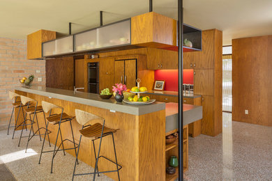 Example of a 1950s eat-in kitchen design in Houston