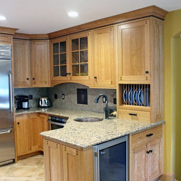 Custom Arts & Crafts Kitchen with Two Tiered Peninsula