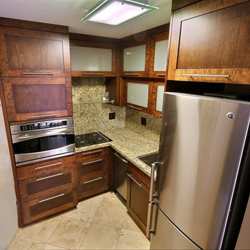 Custom cabinetry, granite and stainless steel appliances in only 50 sq ft