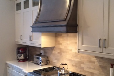 Arts and crafts eat-in kitchen photo in Toronto with shaker cabinets, white cabinets and granite countertops