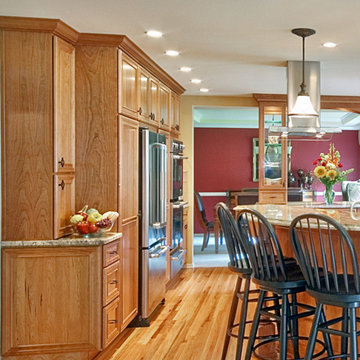 Custom cabinets with built-in refrigerator and appliances