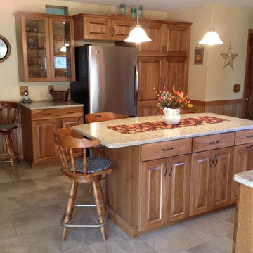 Custom Calico Hickory kitchen stained in Medium Brown.