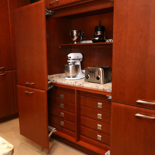 Inspiration for a contemporary galley ceramic tile open concept kitchen remodel in Newark with granite countertops and stainless steel appliances