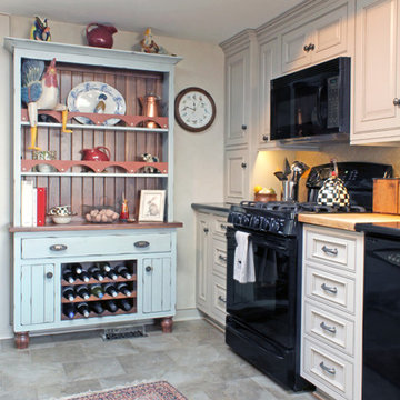 Custom Cream French Country Kitchen with Blue Hutch