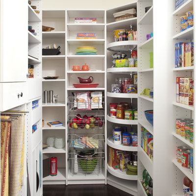 Example of a mid-sized classic dark wood floor kitchen pantry design in Philadelphia with open cabinets and white cabinets