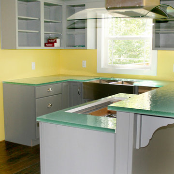 Custom Glass Counter, L-shaped Kitchen with Floating Island and Raised Bar