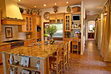 This is an example of a rustic kitchen in Phoenix.
