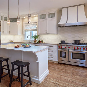 Custom Hood and Sleek White Kitchen