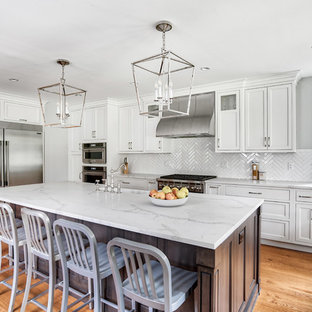 Custom Hood and White Herringbone Backsplash