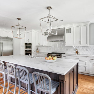 Custom Hood and White Herringbone Backsplash