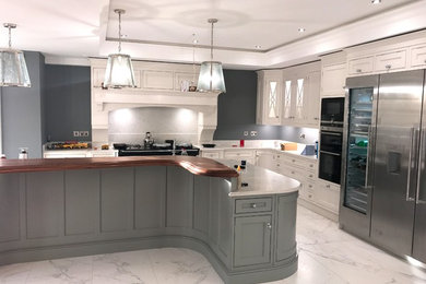 Custom made In frame hand painted kitchen and island in shades of grey