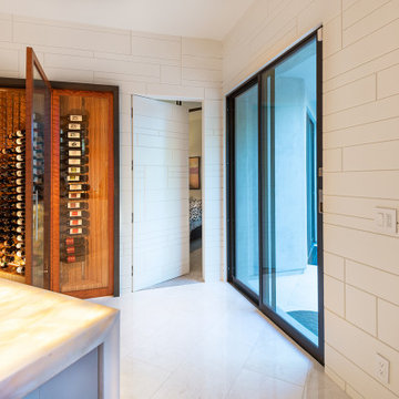 Custom White Panel Wall & Wine Cellar