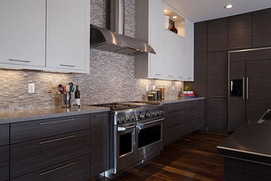 Eat-in kitchen - mid-sized contemporary l-shaped dark wood floor eat-in kitchen idea in Oklahoma City with a single-bowl sink, recessed-panel cabinets, gray cabinets, quartz countertops, multicolored backsplash, mosaic tile backsplash, stainless steel appliances and an island