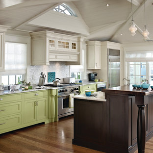 Traditional eat-in kitchen ideas - Inspiration for a timeless l-shaped eat-in kitchen remodel in Philadelphia with green cabinets, flat-panel cabinets and gray backsplash