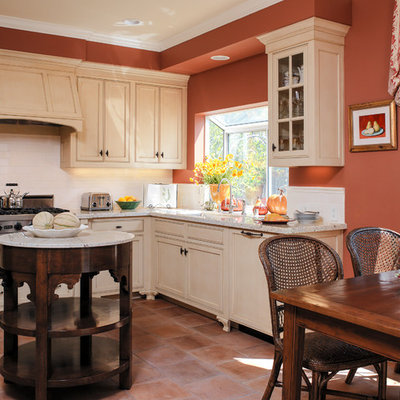 Tuscan kitchen photo in San Francisco with an undermount sink, raised-panel cabinets, white cabinets, white backsplash, subway tile backsplash and paneled appliances