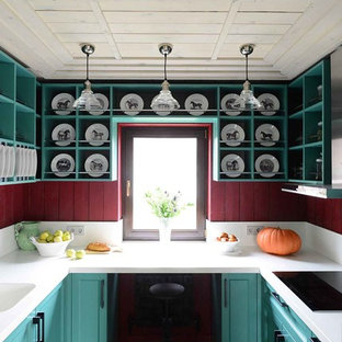 Design ideas for a country u-shaped kitchen in Moscow with an integrated sink, shaker cabinets, green cabinets, red splashback and no island.