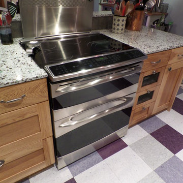Dacor telescoping vent with GE Profile range Ecocrush Arctic countertop