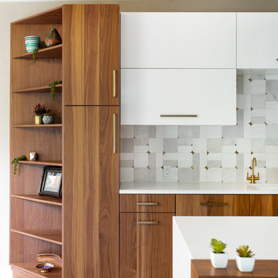 Huge minimalist u-shaped porcelain tile and gray floor eat-in kitchen photo in Dallas with a single-bowl sink, flat-panel cabinets, medium tone wood cabinets, quartz countertops, gray backsplash, marble backsplash, stainless steel appliances and white countertops