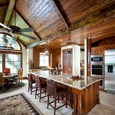 Kitchen - rustic kitchen idea in Dallas with stainless steel appliances