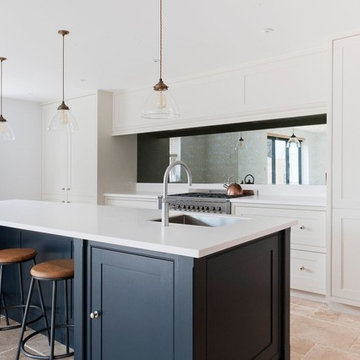 Dark Blue Kitchen with Mirror Splashback